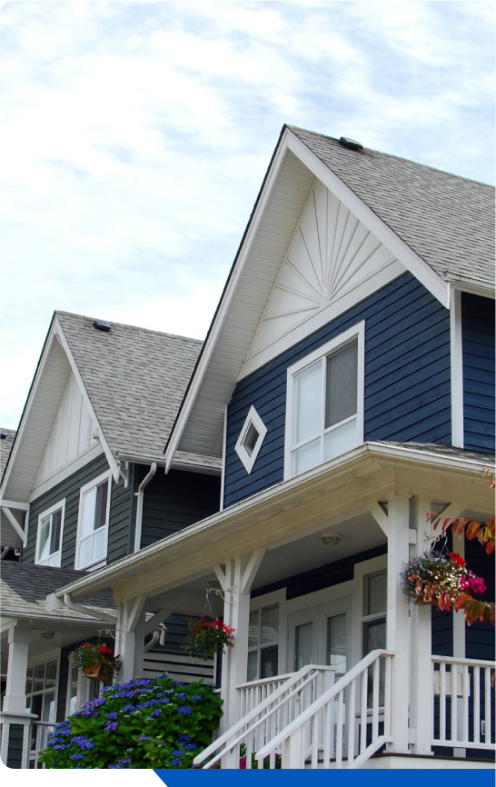 Asphalt roof replacement with blue siding in Westchester County NY