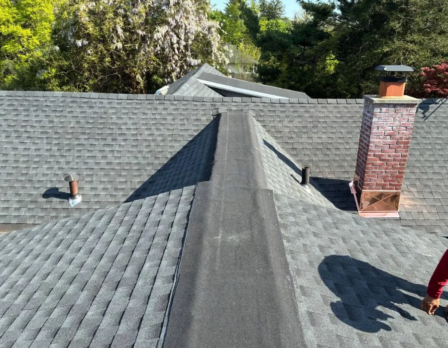 Asphalt shingle roof replacement with ridge vent installation in Westchester County