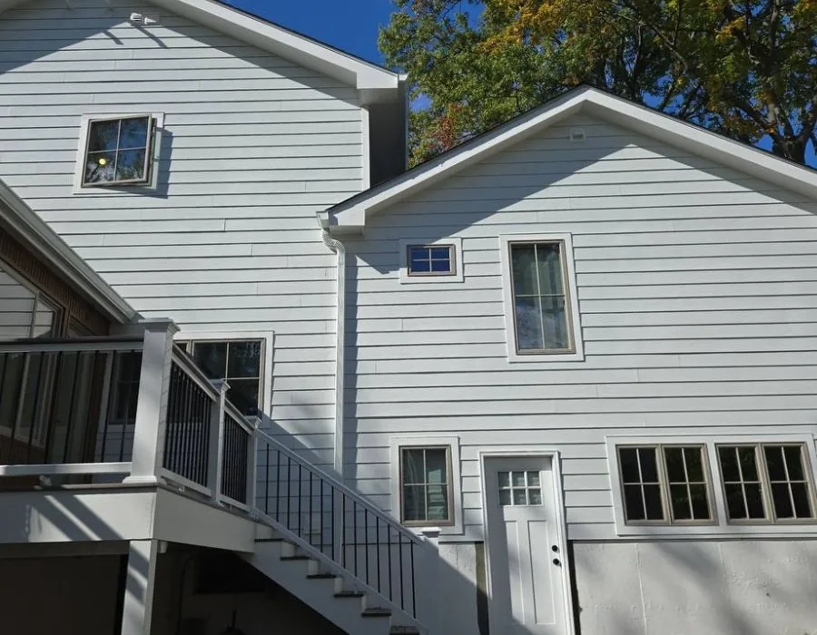 Blue vinyl siding installation on back deck in Westchester County