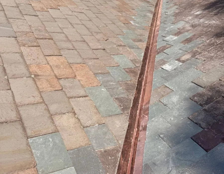Copper valley flashing repair on slate roof in Westchester County