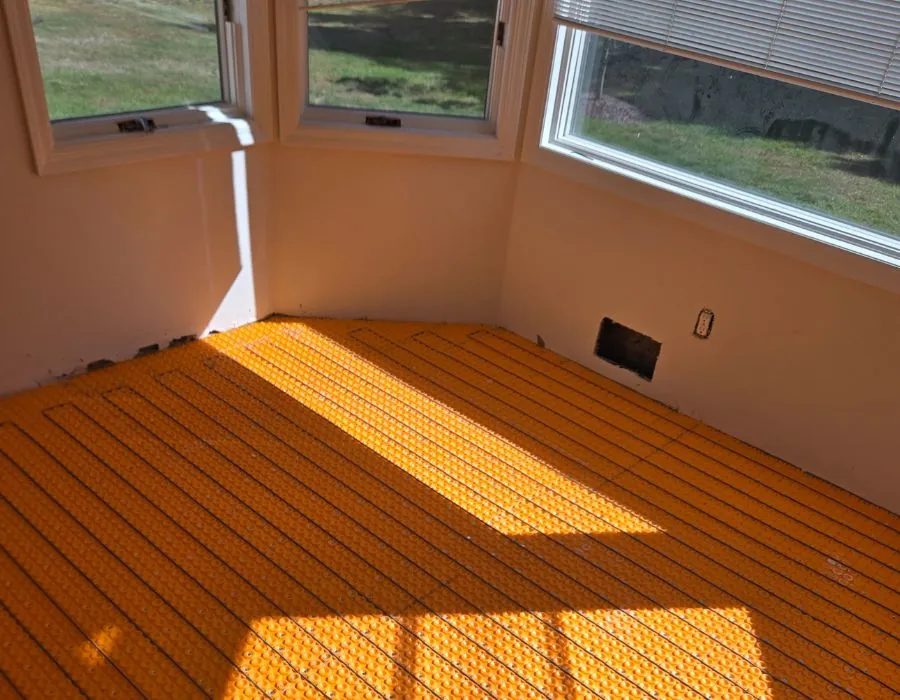 Heated floor installation in Westchester sunroom