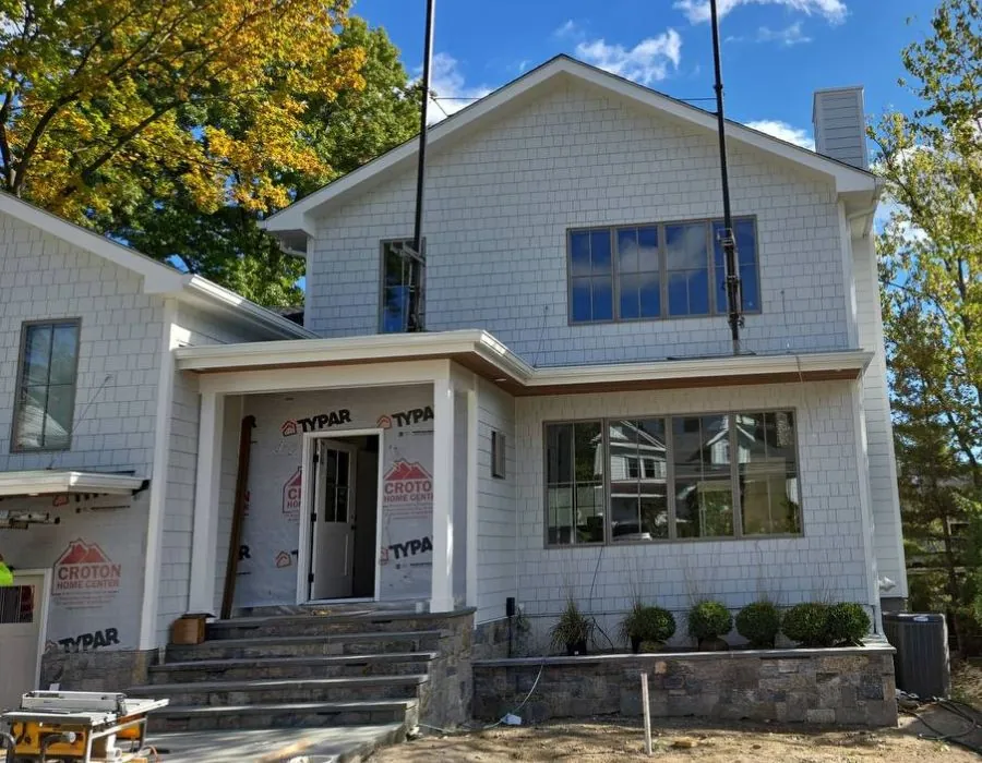 New home with siding and windows installation