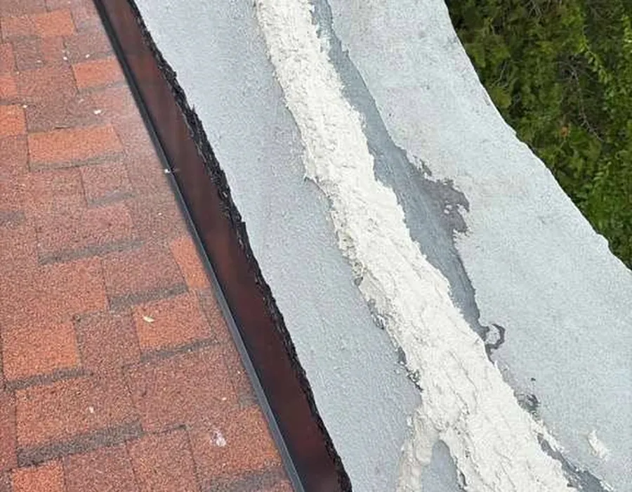 Parapet wall coping repair on asphalt roof in White Plains NY